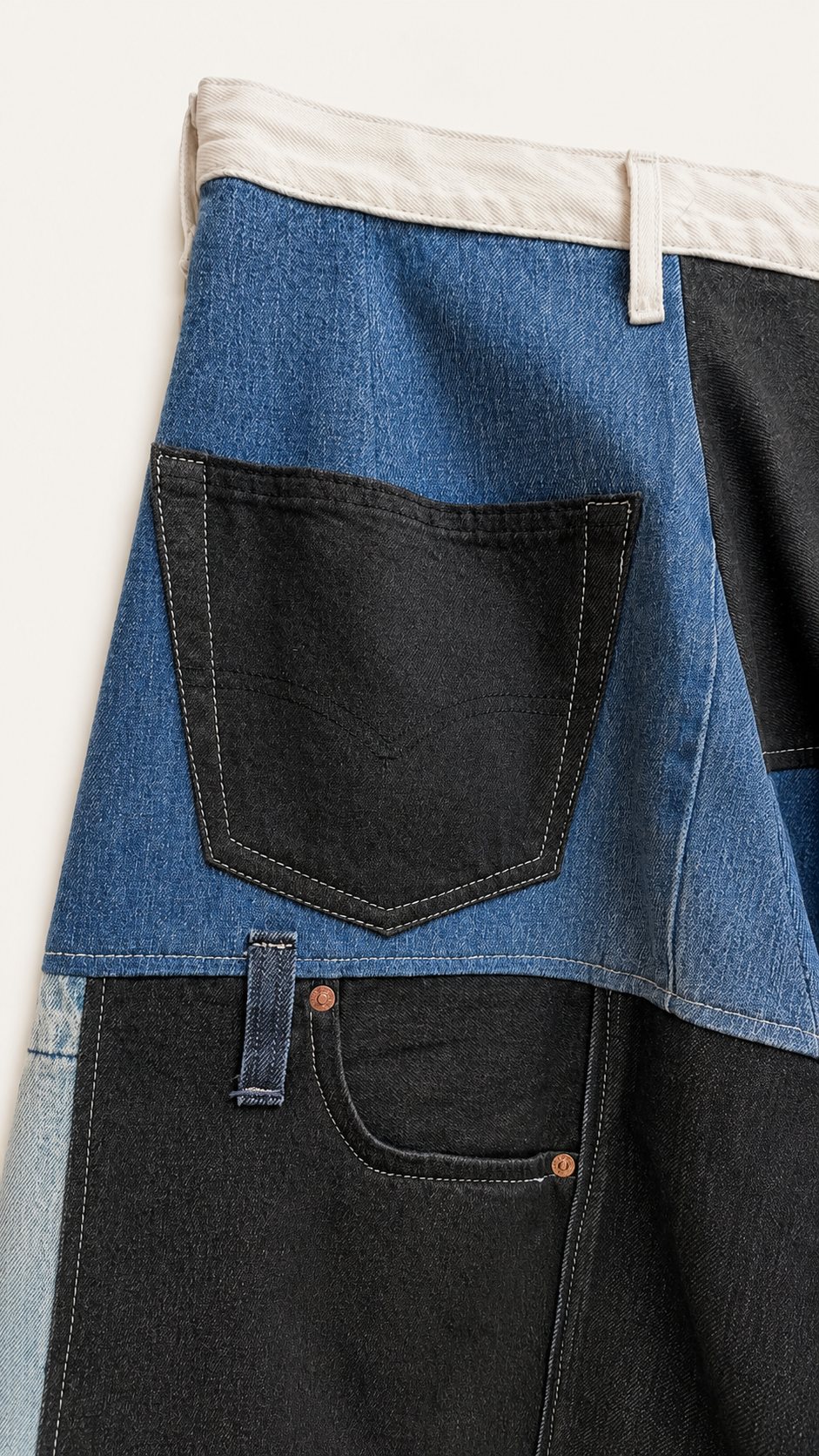 Victor-Hart upcycled denim palazzo pants, fabric detail showing upcycled denim texture