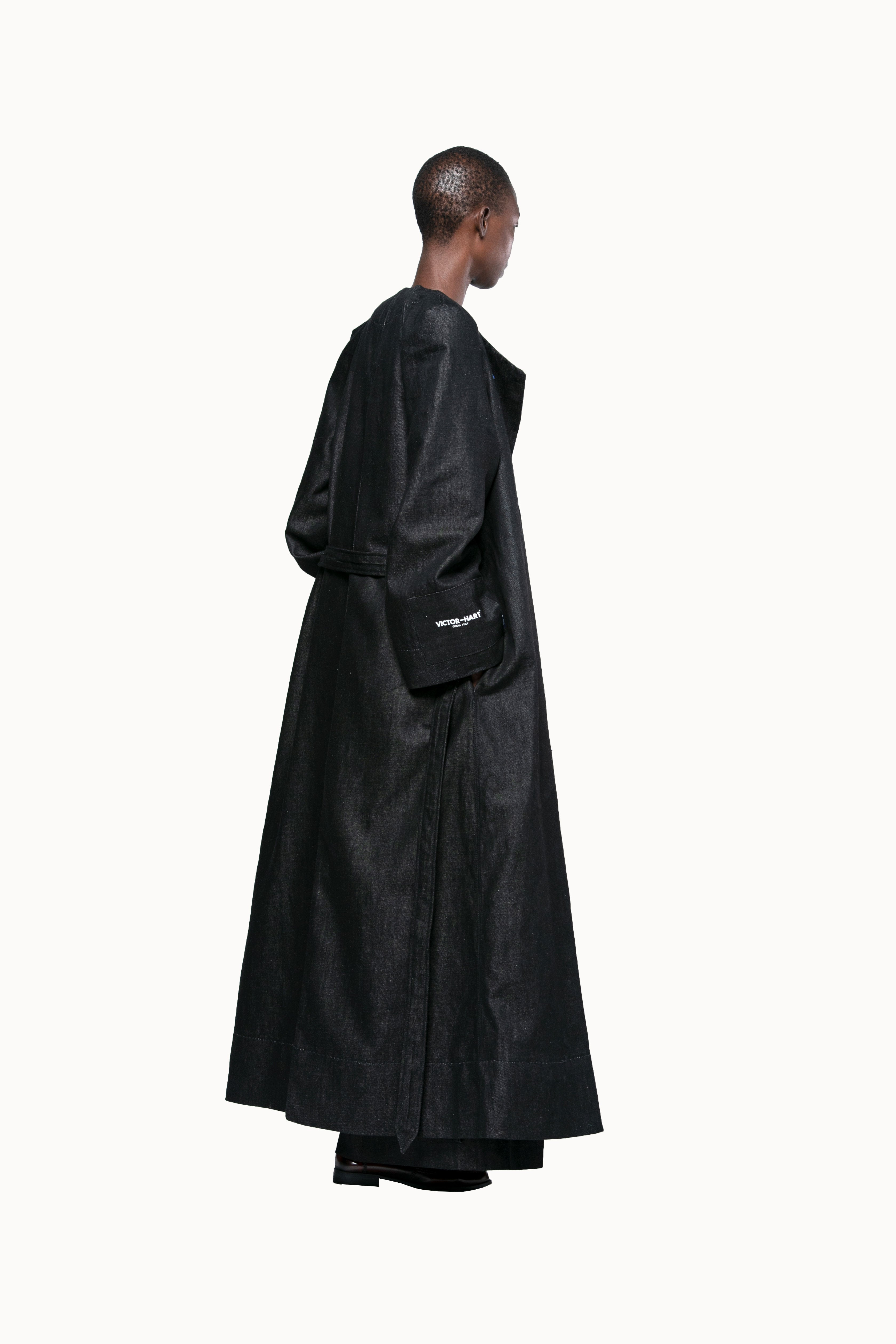 Victor-Hart luxury structured black denim Vtrench coat with architectural tailoring